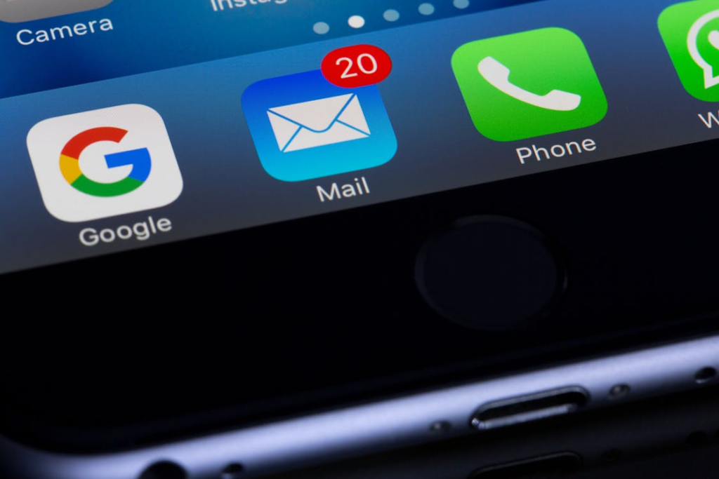 Smartphone home screen showing the Mail app icon with 20 unread notifications alongside Google and Phone apps.