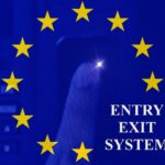Illustration of the EU flag over a smartphone screen displaying “Entry Exit System”