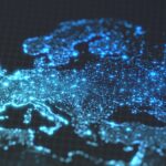 Illustration of a glowing digital map of Europe with interconnected blue lights representing a network
